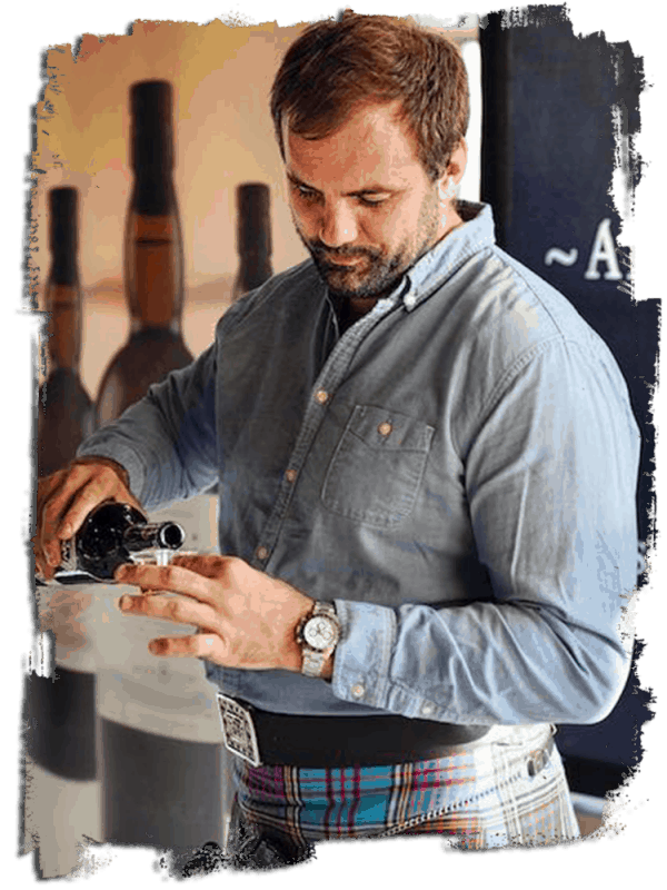Whisky! photo of man pouring whisky scotch