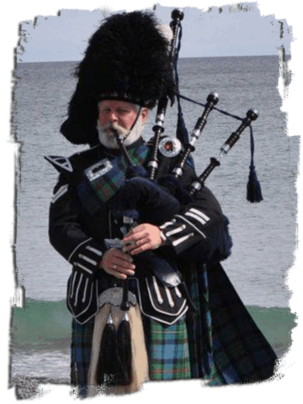 Bagpiper photo of bag piper playing pipes